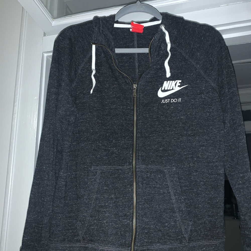 Woman’s Nike jacket. Size L. Dark grey. Used.